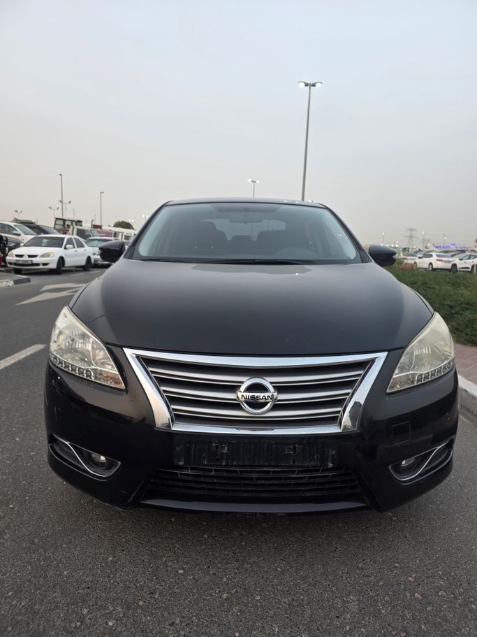 مستعملة Nissan Sentra سابعاً (B17), 1.6 l, 2014 في في دبي من WADHWANI CARS DUBAI، اللون أسود. المواصفات اليابانية | AUTO.AE | إعلان #255839