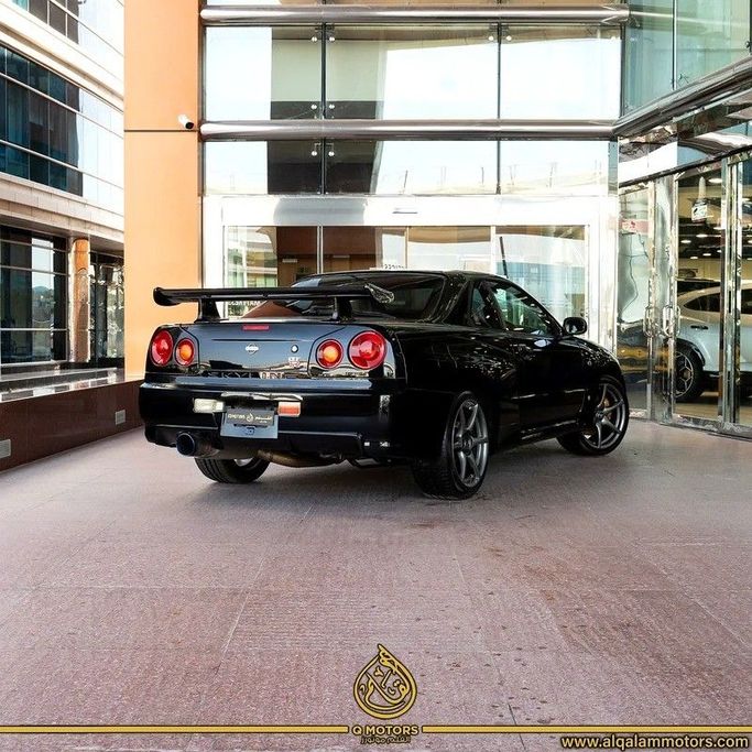 Подержанный Nissan Skyline GT-R X (R34), 2.6 л, 1999 в Дубае от Q Motors Черный цвет. Японская | AUTO.AE