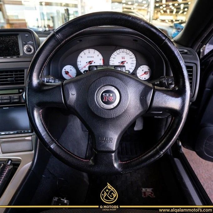 Подержанный Nissan Skyline GT-R X (R34), 2.6 л, 1999 в Дубае от Q Motors Черный цвет. Японская | AUTO.AE