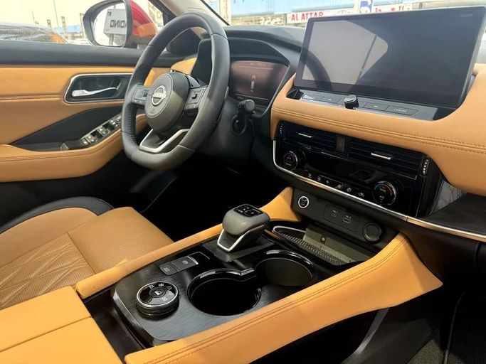 Подержанный Nissan X-Trail IV, 1.5 л, 2023 в Дубае от Nice Cars Motos Красный цвет. GCC | AUTO.AE