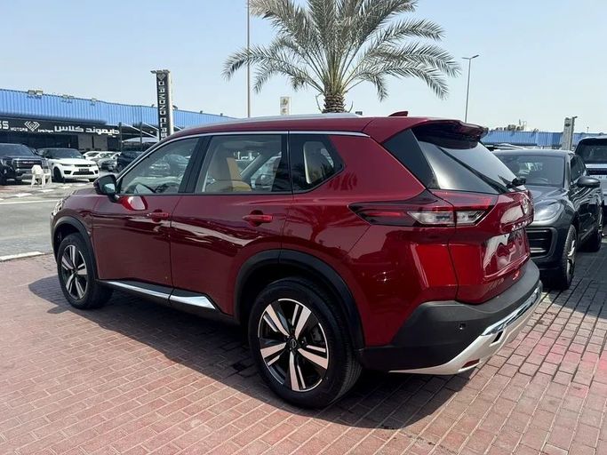 Подержанный Nissan X-Trail IV, 1.5 л, 2023 в Дубае от Nice Cars Motos Красный цвет. GCC | AUTO.AE