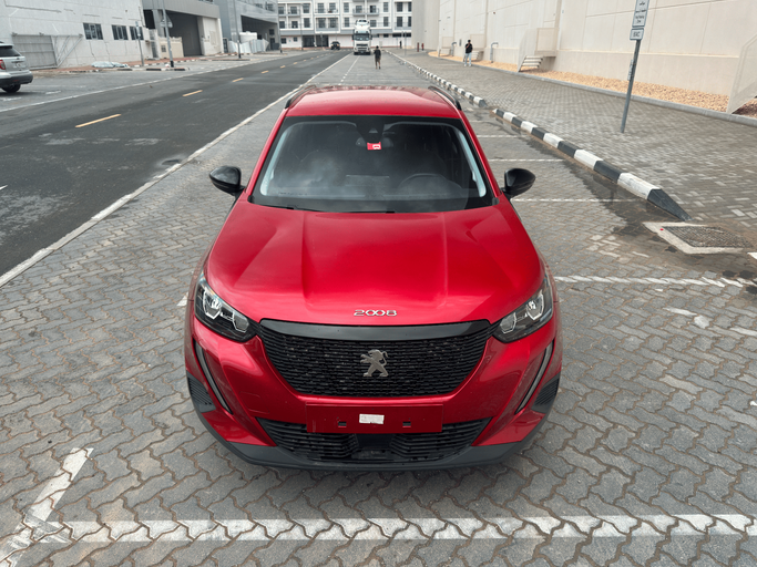 Подержанный Peugeot 2008 II, 1.2 л, 2023 в Дубае Бордовый цвет. GCC | AUTO.AE