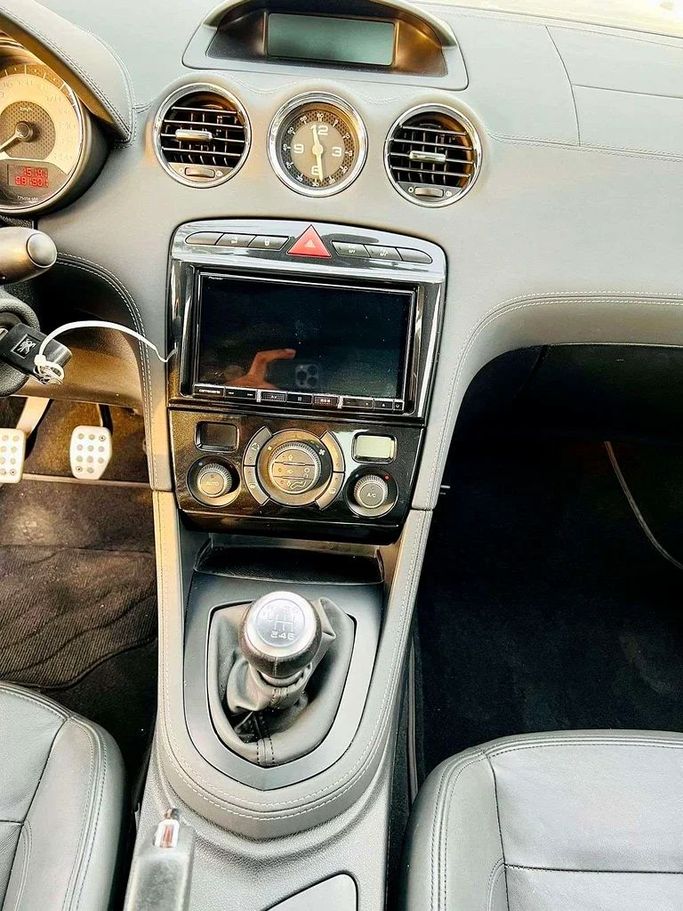 Подержанный Peugeot RCZ I, 1.6 л, 2011 в Дубае от Mirza Automobile FZE Черный цвет. Японская | AUTO.AE