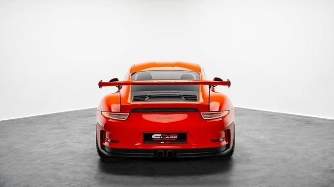 Подержанный Porsche 911 GT3 RS 991, 4.0 л, 2016 в Дубае от Al Ain Class Motors Оранжевый цвет. GCC | AUTO.AE