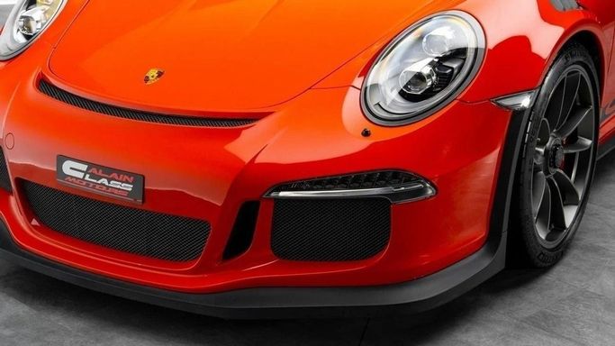 Подержанный Porsche 911 GT3 RS 991, 4.0 л, 2016 в Дубае от Al Ain Class Motors Оранжевый цвет. GCC | AUTO.AE