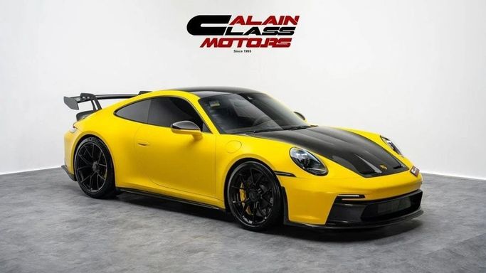 Used Porsche 911 GT3 992, 4.0 l, 2022 in Dubai by Al Ain Class Motors, Yellow color. GCC Specs | AUTO.AE