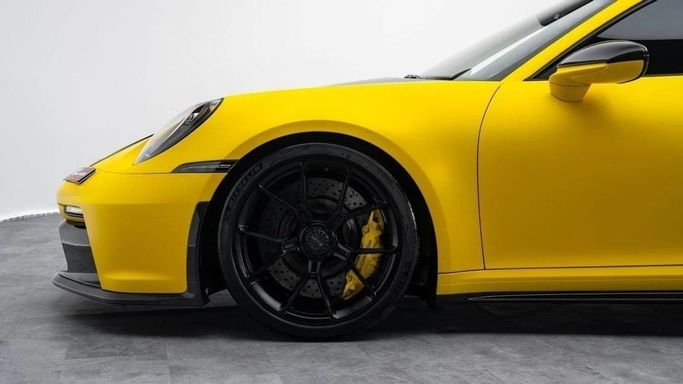 Used Porsche 911 GT3 992, 4.0 l, 2022 in Dubai by Al Ain Class Motors, Yellow color. GCC Specs | AUTO.AE