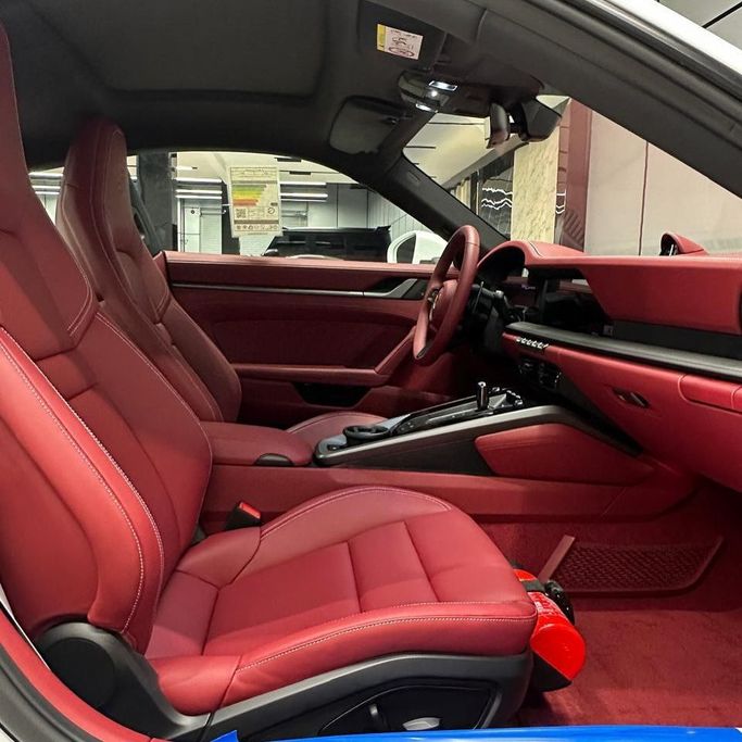 Новый Porsche 911 Carrera VIII (992) Рестайлинг, 3.0 л, 2025 в Дубае от AAA Motors Белый цвет. GCC | AUTO.AE