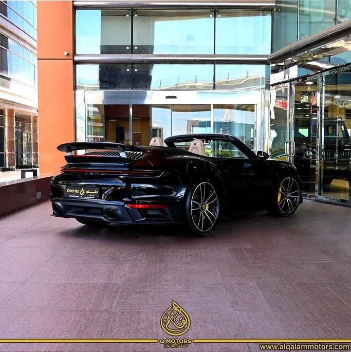 New Porsche 911 Turbo S VIII (992), 3.7 l, 2023 in Dubai by Q Motors, Black color. European Specs | AUTO.AE