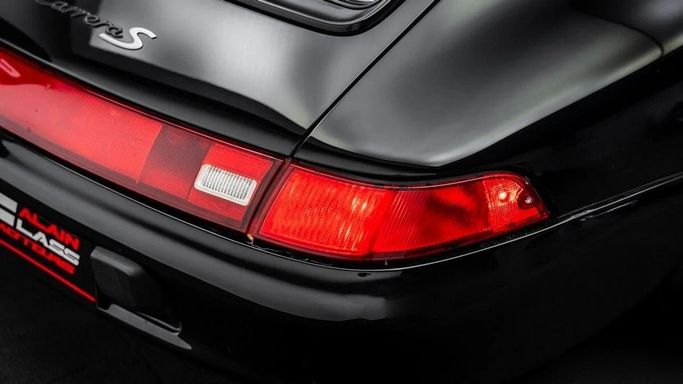 Подержанный Porsche 911 Carrera S IV (993), 3.6 л, 1998 в Дубае от Al Ain Class Motors Черный цвет. Американская | AUTO.AE