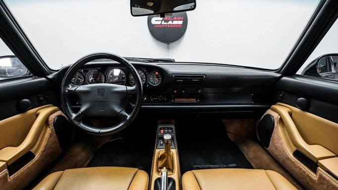 Подержанный Porsche 911 Carrera S IV (993), 3.6 л, 1998 в Дубае от Al Ain Class Motors Черный цвет. Американская | AUTO.AE