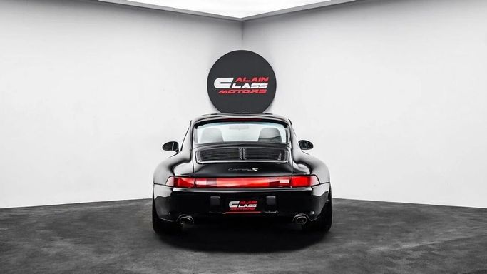 Подержанный Porsche 911 Carrera S IV (993), 3.6 л, 1998 в Дубае от Al Ain Class Motors Черный цвет. Американская | AUTO.AE