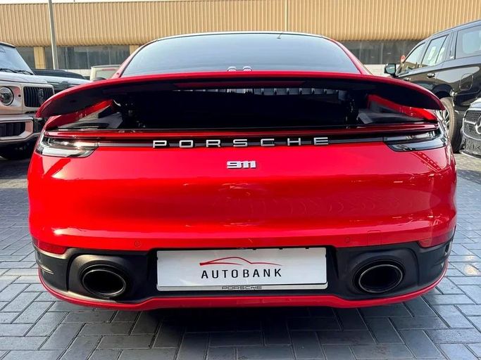 Used Porsche 911 Carrera VIII (992), 3.0 l, 2021 in Dubai by Auto Bank Motors, Red color. Korean Specs | AUTO.AE