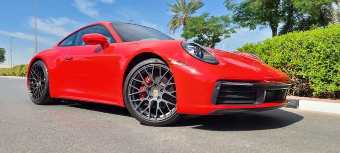 Used Porsche 911 Carrera 4 VIII (992), 3.0 l, 2021 in Dubai by Space Motors, Red color. American Specs | AUTO.AE