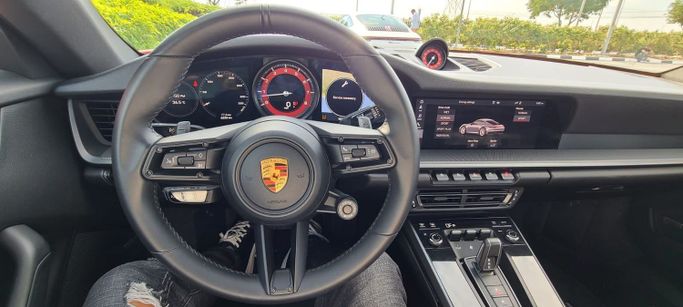 Used Porsche 911 Carrera 4 VIII (992), 3.0 l, 2021 in Dubai by Space Motors, Red color. American Specs | AUTO.AE