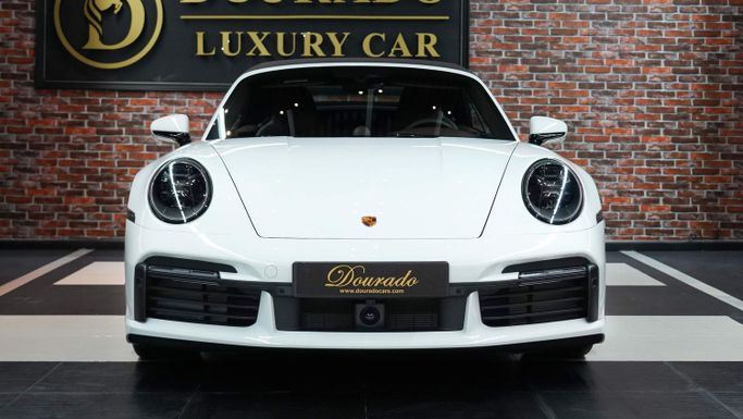 Новый Porsche 911 Turbo S VIII (992), 3.7 л, 2023 в Дубае от Dourado Luxury Car Белый цвет. Европейская | AUTO.AE