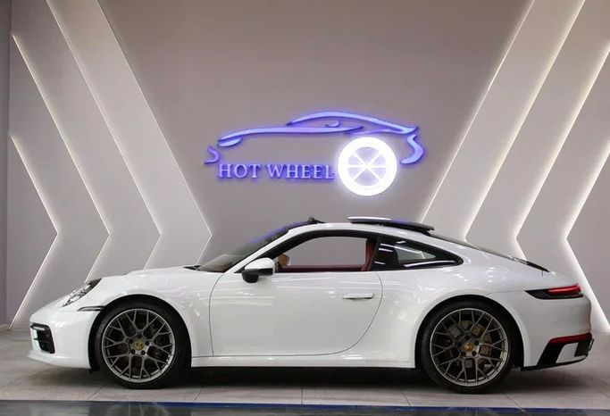 Подержанный Porsche 911 Carrera VIII (992), 3.0 л, 2023 в Дубае от Hot Wheel Used Motors Белый цвет. GCC | AUTO.AE