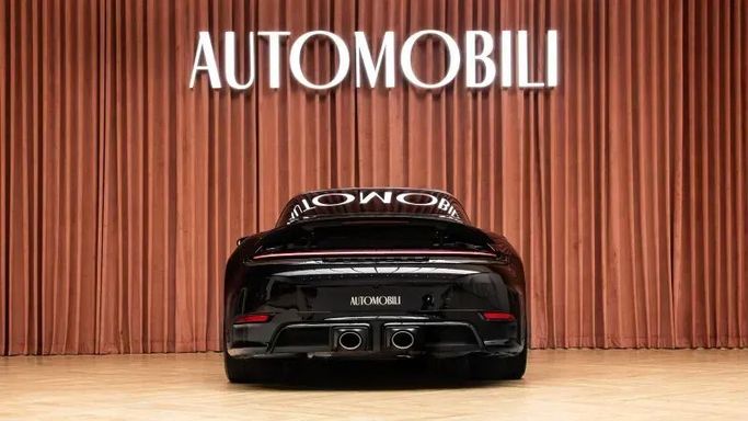 Подержанный Porsche 911 4 GTS VIII (992), 3.0 л, 2025 в Дубае от Automobili Motors Черный цвет. Европейская | AUTO.AE