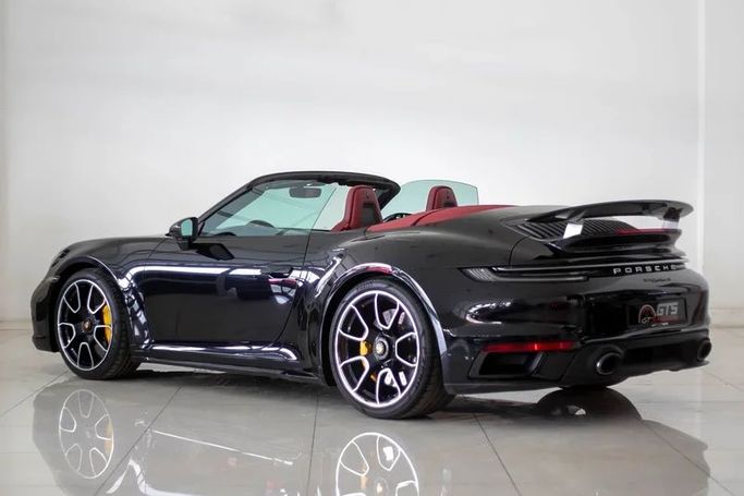 Подержанный Porsche 911 Turbo S VIII (992), 3.7 л, 2023 в Дубае от GTS Motors Черный цвет. Европейская | AUTO.AE