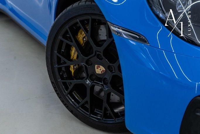 Подержанный Porsche 911 Carrera GTS VIII (992), 3.0 л, 2023 в Дубае от A1 Luxury Motors Синий цвет. GCC | AUTO.AE