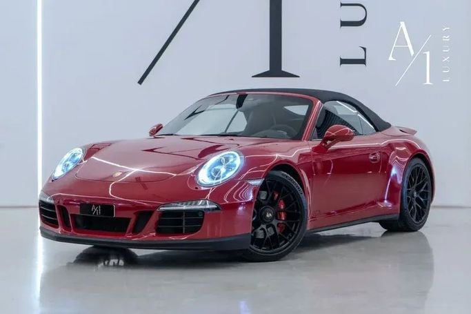 Подержанный Porsche 911 Carrera GTS VII (991) Рестайлинг, 3.0 л, 2016 в Дубае от A1 Luxury Motors Красный цвет. GCC | AUTO.AE