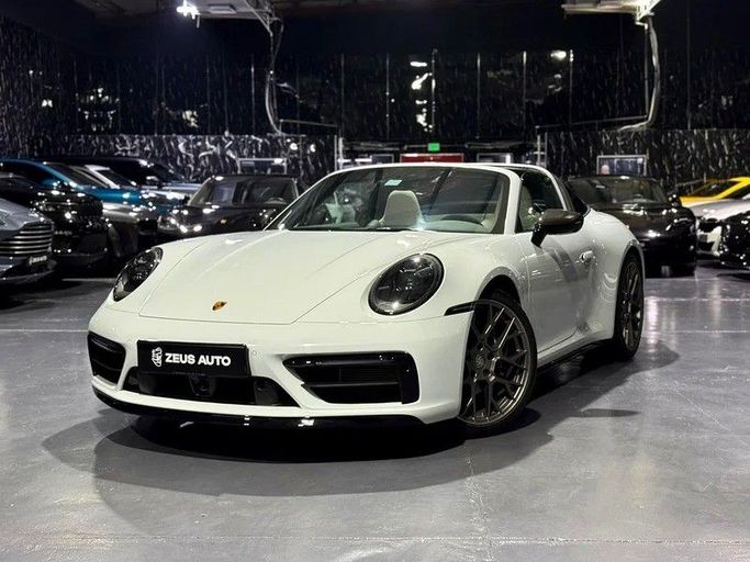 Used Porsche 911 4 VIII (992), 3.0 l, 2023 in Dubai by Zeus Motors, White color. European Specs | AUTO.AE