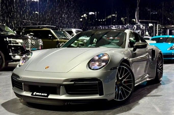 Used Porsche 911 Turbo VIII (992), 3.7 l, 2023 in Dubai by Zeus Motors, Silver color. GCC Specs | AUTO.AE