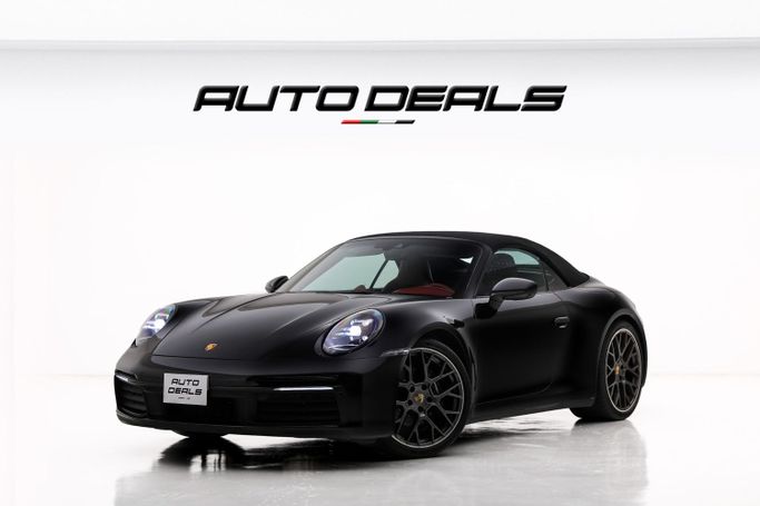 Подержанный Porsche 911 Carrera VIII (992), 3.0 л, 2023 в Дубае от AUTO DEALS Черный цвет. GCC | AUTO.AE