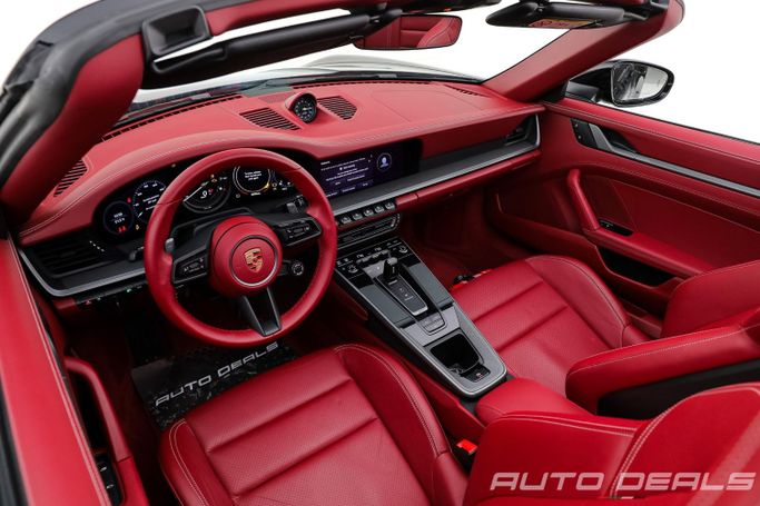 Подержанный Porsche 911 Carrera VIII (992), 3.0 л, 2023 в Дубае от AUTO DEALS Черный цвет. GCC | AUTO.AE