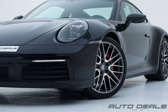 Новый Porsche 911 Carrera S VIII (992), 3.0 л, 2024 в Дубае от AUTO DEALS Черный цвет. GCC | AUTO.AE