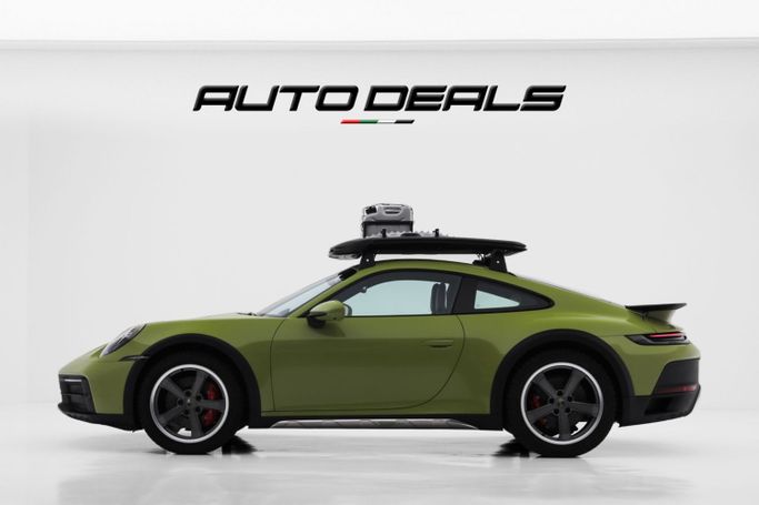 Новый Porsche 911 Dakar VIII (992), 3.0 л, 2024 в Дубае от AUTO DEALS Зеленый цвет. Европейская | AUTO.AE