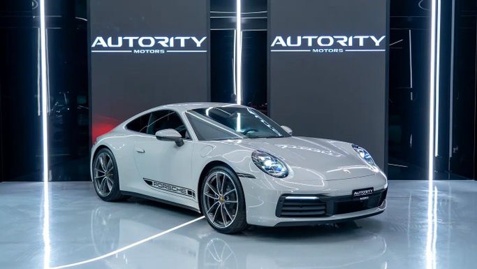 Подержанный Porsche 911 Carrera VIII (992), 3.0 л, 2024 в Дубае от Autority Motors Серый цвет. Японская | AUTO.AE