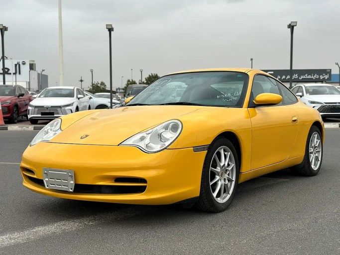 Подержанный Porsche 911 Carrera 4 V (996) Рестайлинг, 3.6 л, 2002 в Дубае от HAROON SHARIF MOTORS Желтый цвет. Японская | AUTO.AE