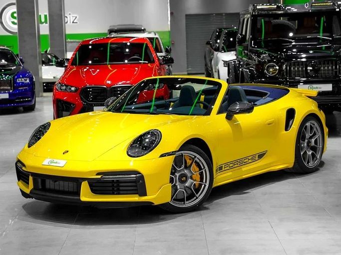 Новый Porsche 911 Turbo S VIII (992), 3.7 л, 2024 в Дубае от Stoub.biz Желтый цвет.  | AUTO.AE