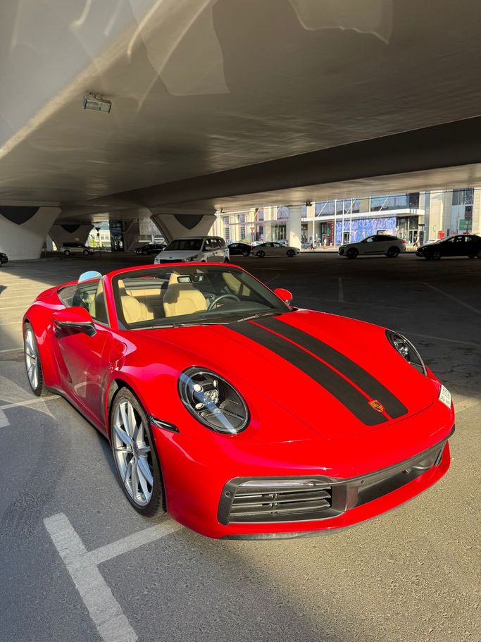 Подержанный Porsche 911 Carrera VIII (992) Рестайлинг, 3.0 л, 2024 в Дубае Красный цвет. Американская | AUTO.AE