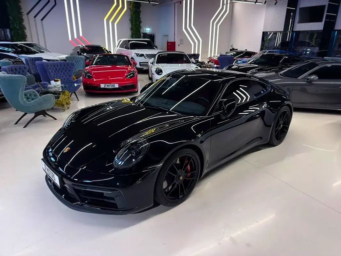 مستعملة Porsche 911 Carrera 4 ثامناً (992), 3.0 l, 2024 في في دبي من GE Motors، اللون أسود. المواصفات الكورية | AUTO.AE | إعلان #265000