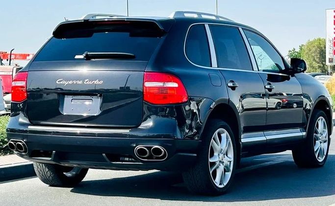 Подержанный Porsche Cayenne Turbo I Рестайлинг (957), 4.8 л, 2008 в Дубае от Mirza Automobile FZE Черный цвет. Японская | AUTO.AE