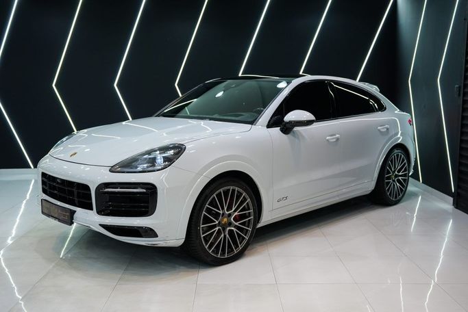 Used Porsche Cayenne GTS III, 4.0 l, 2021 in Dubai by Sanam Cars, White color. GCC Specs | AUTO.AE
