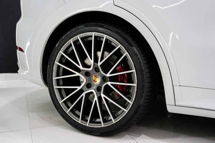 Used Porsche Cayenne GTS III, 4.0 l, 2021 in Dubai by Sanam Cars, White color. GCC Specs | AUTO.AE