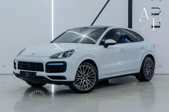 Подержанный Porsche Cayenne Coupé III, 3.0 л, 2023 в Дубае от A1 Luxury Motors Белый цвет. GCC | AUTO.AE