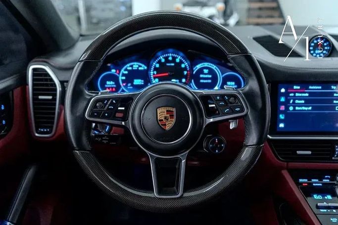 Подержанный Porsche Cayenne Coupé III, 3.0 л, 2023 в Дубае от A1 Luxury Motors Белый цвет. GCC | AUTO.AE