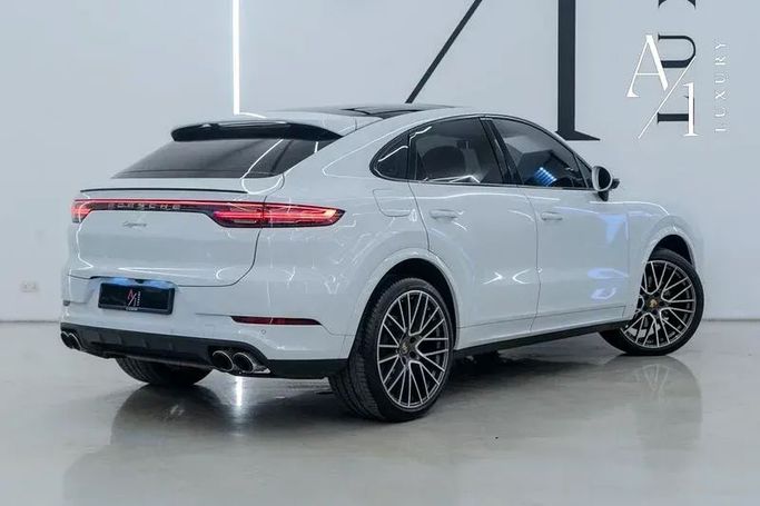 Подержанный Porsche Cayenne Coupé III, 3.0 л, 2023 в Дубае от A1 Luxury Motors Белый цвет. GCC | AUTO.AE