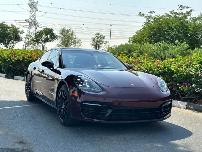 Подержанный Porsche Panamera GTS II Рестайлинг, 4.0 л, 2021 в Дубае от 99 Motors LLC Красный цвет. Американская | AUTO.AE