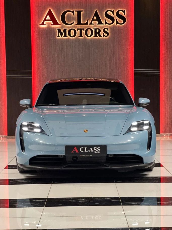 Used Porsche Taycan I, 2022 in Dubai by A Class Motors, Light Blue color.  | AUTO.AE