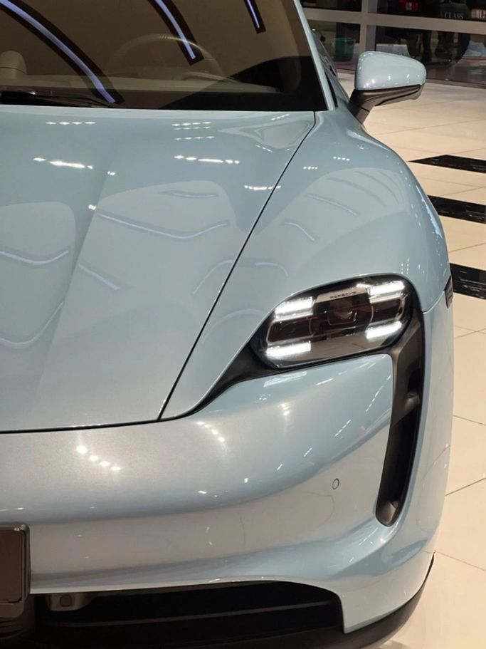 Used Porsche Taycan I, 2022 in Dubai by A Class Motors, Light Blue color.  | AUTO.AE