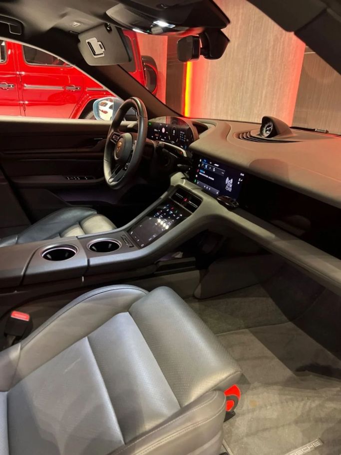 Used Porsche Taycan I, 2022 in Dubai by A Class Motors, Light Blue color.  | AUTO.AE