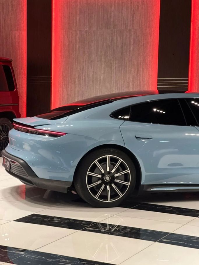 Used Porsche Taycan I, 2022 in Dubai by A Class Motors, Light Blue color.  | AUTO.AE