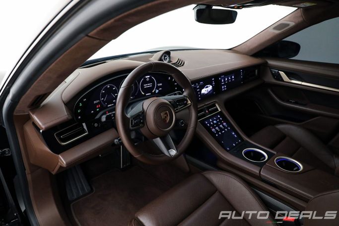 Подержанный Porsche Taycan Turbo S I, 2021 в Дубае от AUTO DEALS Черный цвет. Европейская | AUTO.AE