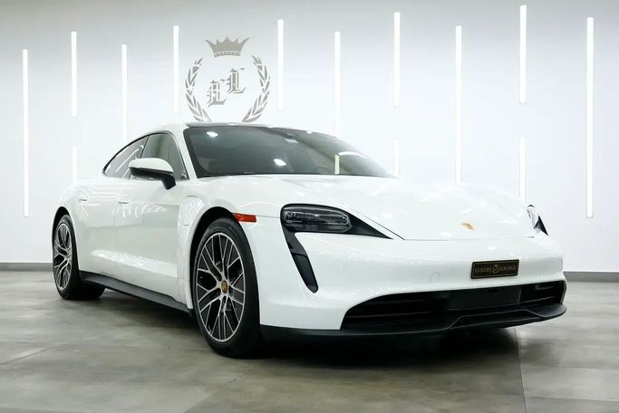 Подержанный Porsche Taycan I, 2023 в Дубае от Luxury Lounge Cars Белый цвет. Американская | AUTO.AE