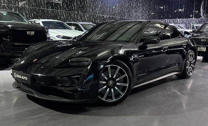 Подержанный Porsche Taycan I Рестайлинг, 2024 в Дубае от Zeus Motors Черный цвет. GCC | AUTO.AE